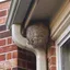 Wasp nest under roof eaves, a common sign of a wasp problem in {city}, {state}